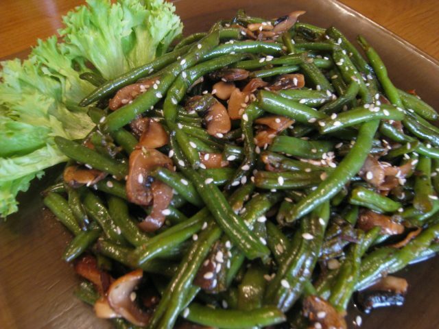 Salad from green beans and champignons