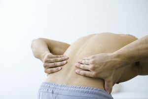Sintomas e tratamento da miosite dos músculos das costas