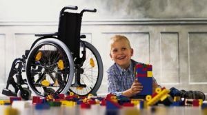 a wheelchair and a child