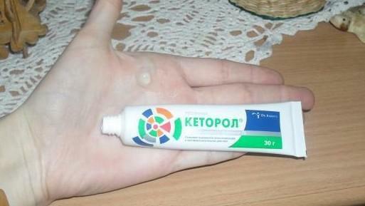 Transparent ointment on the arm - photo
