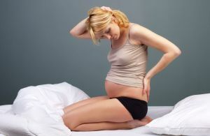 Funktioner af osteochondrose under graviditet: Hvad risikerer en kvinde?