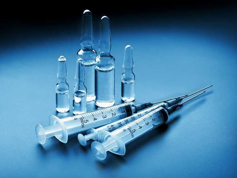 Methods for disinfecting needles and syringes
