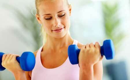 Exercises for hands of women with dumbbells at home