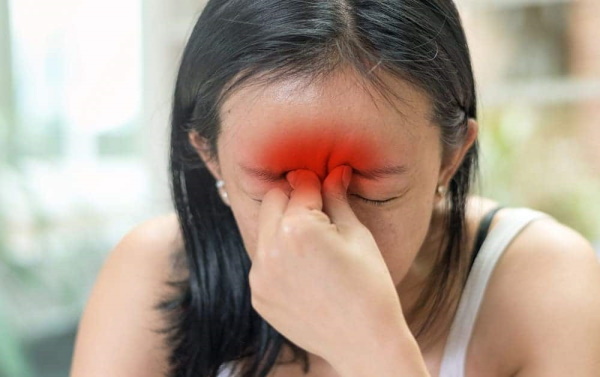 Pain in the forehead above the bridge of the nose, in the eyes, when bending over. Causes