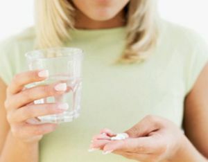 het nemen van tabletten met artrose